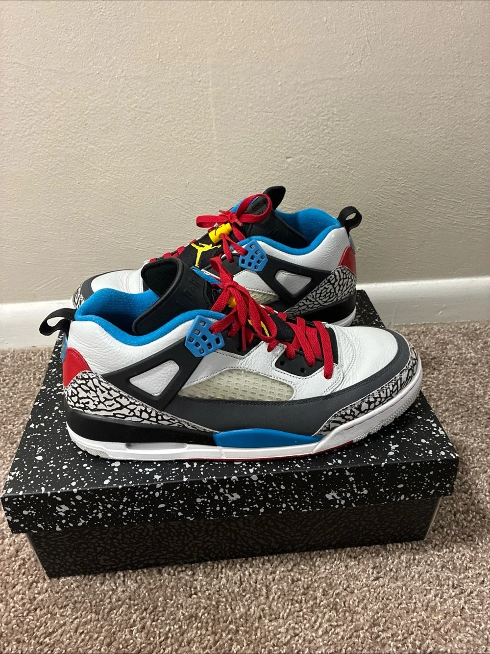 Jordan Men's White Athletic Shoes with Black, Red & Blue Accents
